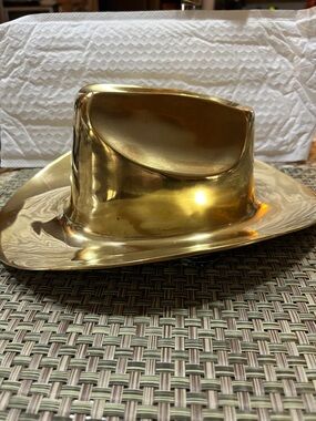 Vintage brass cowboy hat